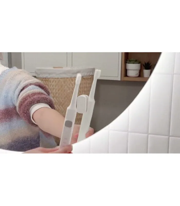 LUXVION K8 Şarjlı Diş Fırçası tanıtım videosu, manyetik tutucuda iki fırça